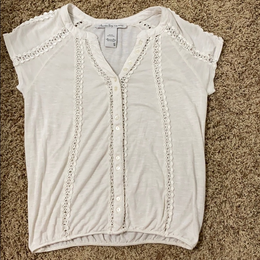 cream colored top